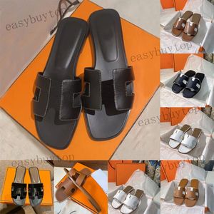 Sandales Femmes Flats Sandale Designer Slippers Real Cuir Luxury Slipper Summer Beach Shoes Locs Outdoor Ladies plate-forme glissa
