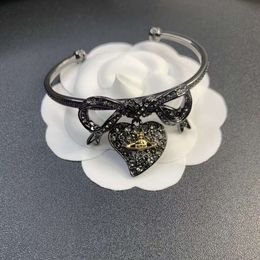 Satellite Viviane Viviennes Westwood Xis High Version Titanium Black Bow Heart Bracelet Personnalisé et Bracelet de diamant noir personnalisé et de haute qualité