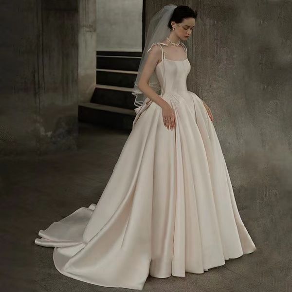 Satin Une Ligne Robes De Mariée sangle perlée crtstal Tribunal Train Dos Nu Jardin De Mariage Robes De Mariée arc Ivoire Tulle Plus La Taille Robe De Mariée Robe De Novia Arabie Saoudite