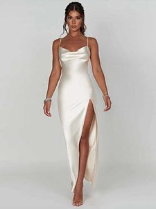 Satijn Maxi -jurk voor vrouwen zomer 2023 Nieuwe mode Backless Slim High Split Camis -jurken Mouwloze feestjurk