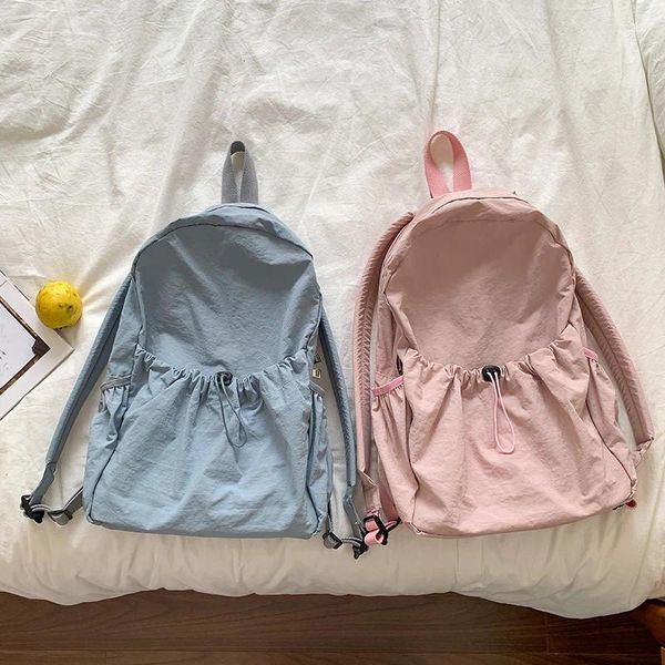 Bolsas escolares 2024 Nylon Casual Nylon Women's Youth Zipper Mochila mochila Middle Coreano Estilo de estilo Lady Shoules Venta entera Venta entera