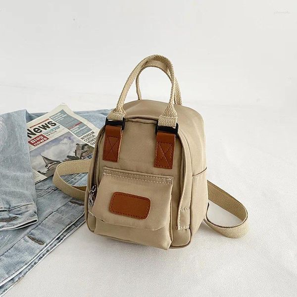 Sacs d'école sac à dos femme tendance Mini Version coréenne de couleur unie mode toile légère étudiant sac à main voyage petit vente en gros