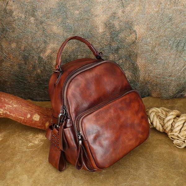 Sacs d'école en cuir véritable sac à dos pour femme voyage Design extérieur rétro Niche petits sacs à dos Simple sac de sens de haut niveau
