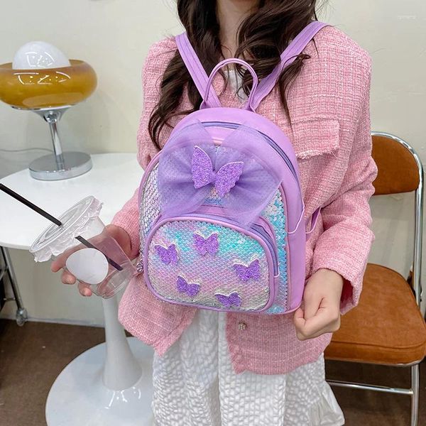 Mochilas escolares Versión coreana de la mochila para niños Linda pequeña princesa Lentejuelas Arco Pequeño jardín de infantes Bolsa de viaje ligera para niños