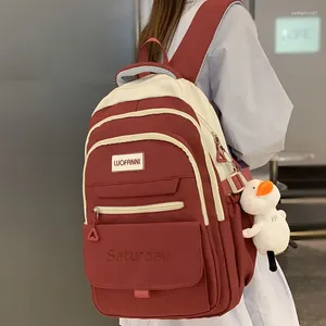 Sacs scolaires Mesdames High Capace Red Loisir College Sac à dos Trendy Fashion Fashion Nylon Livre d'ordinateur portable Fille mignon Bag de voyage Femme