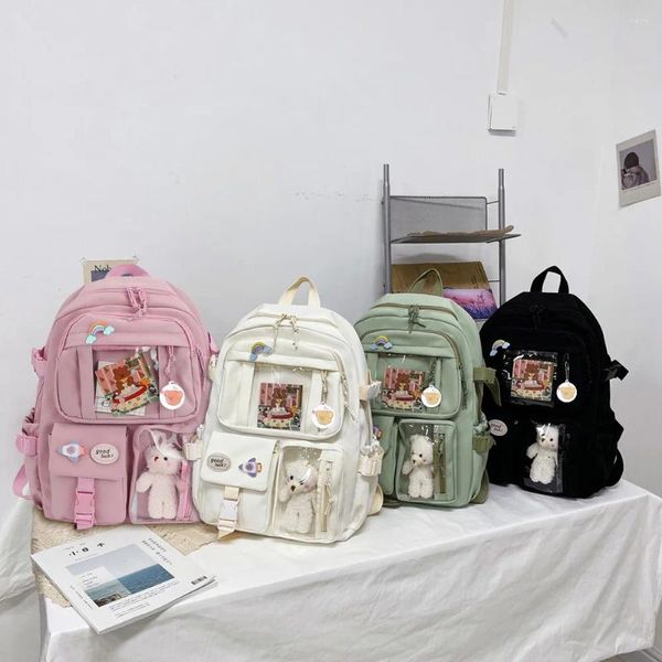 Bolsas escolares mochila para computadora portátil mochila universitaria de alumno de alumno con alfiler de felpa