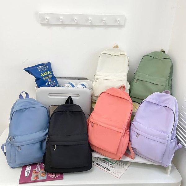 Mochilas escolares Mochila de gran capacidad Estilo casual Ins Moda para chicas Versión coreana Mochila para estudiantes universitarios simples Viajes al por mayor