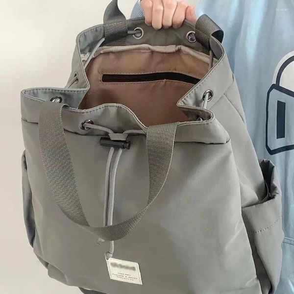 Sacs d'école grande capacité sac à dos à cordon 2023 imperméable gris sac à main de transport en nylon sac à dos à bandoulière unisexe