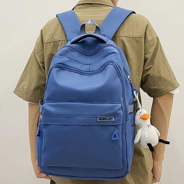 Bolsas escolares Mochila para computadora portátil azul unisex Mochila de tela de nailon ecológico de gran capacidad con múltiples bolsillos para amantes Mochila espaciosa con colgante de pato