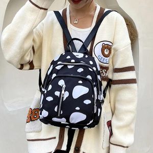 Sacs d'école Y2K Cow Print Backpack For Women Dame Girls Girls Outdoor Travel Shopping Nylon Casual Rucksack Mini Book Bag