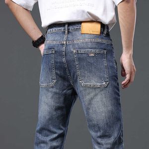 Seasons vier slanke fit heren jeans elastiek comfortabele casual slijtage veelzijdige trendy gewassen broek