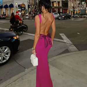 Geselecteerde heet verkopende nieuwe sexy backless slanke passende patchwork bow wrap billen temperament lange jurk voor vrouwen f51533
