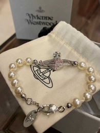 Geselecteerde Tiktok Hot Sale Westwood Pearl Pink Diamond Saturn Bracelet Fashion High End Handwar