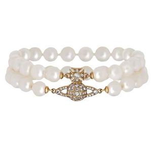 Sélectionné Westwood Double Layered Pearl Saturn Magnetic Bracelet Bracelet Womens Classic Full Diamond Planet Nail avec logo