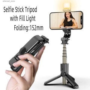 Selfie Monopods Trépied de bâton de selfie à distance sans fil avec lumière de remplissage Mini trépied de téléphone support de support de téléphone portable pliable pour smartphone nouveau Q231110