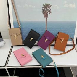 Vendre des sacs de créateurs à bas prix 2023 New Fashion en cuir de vachette pour femmes Sac vertical en cuir Mobile Mini Crossbody