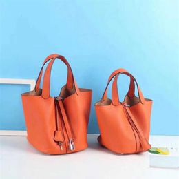 Verkoop designer tassen op de goedkope 2023H nieuwe eerste laag litchi lederen bucket merk mode draagbare groentemand dames 230T
