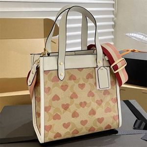Vender Love Print Designer Tote Bag Women Totes Bolsas de compras de moda COAOCS Classic C Letter Luxury Handbag