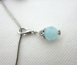 Vente 100pcs Wathet Blue Mois Birthstone Crystal Slearms Charms Lobster Clasp Charms For Glass Floating Lods2388332