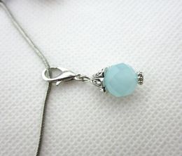 Vente 100pcs Wathet Blue Mois Birthstone Crystal Charms Charmes Lobster Clasp Charms For Glass Floating Lods6506946