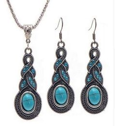 Vendre des bijoux de collier de pendentif en chaîne européenne Ensemble de bijoux vintage Modèle de bijoux en cristal bleu Collier d'oreilles cadeaux pour filles JQ4181551674