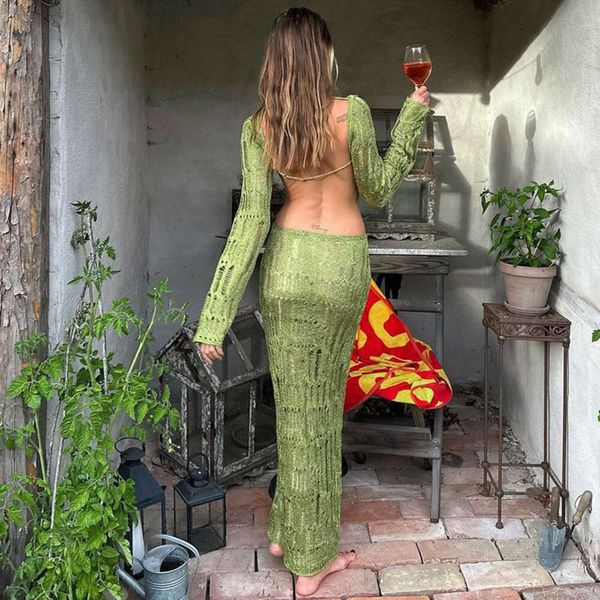 Vendre le printemps chaud nouveau sexy backless Hollow Out Perspective Slived Slim Fit Temperament Long Woolen Tipe Robe for Women