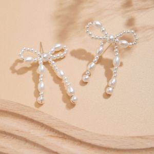 Verkoop sieraden Hot Bow Franse Tassel Minimalistische imitatie Pearl Bowearring Oorbellen