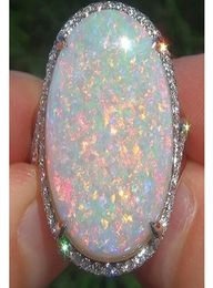 Venda super grande anel opel moda senhoras jóias cobre banhado a prata incrustada zircão anel artificial opala jóias atacado9585671