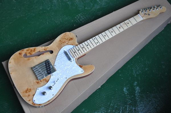 Guitarra eléctrica de color madera natural semihueca con chapa de burl, golpeador de perla blanca, diapasón de arce, herrajes cromados, brinda servicios personalizados