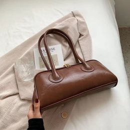 Senior gevoel van licht luxe retro schoudertas vrouwelijke 2023 nieuwe Hong Kong wind okseltas kleine mode ins baguette tas