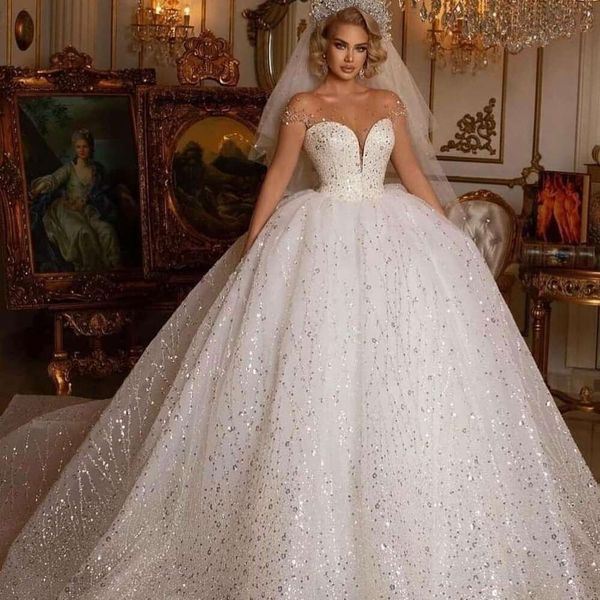 Vestidos de novia de vestidos impresionantes de bola de lacones