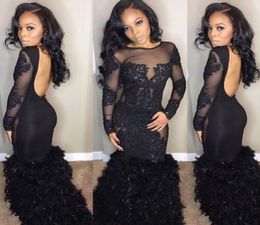 Sexy Plume Noire Sirène Bal Drsses Sheer Cou Manches Longues Appliques Perlée Tulle Dos Nu Filles Africaines 2K17 Robes De Soirée Pour5852453