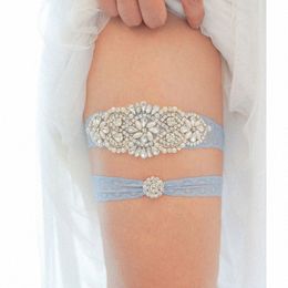 Coutrage de mariage de mariée sexy avec diamds jarretières en cristal bleu clair