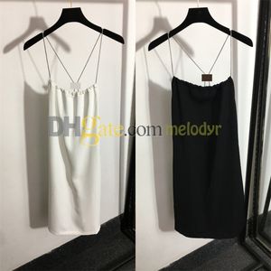 Vestido Sexy con tirantes de cadena para mujer, faldas con espalda descubierta para vacaciones de verano, placa de Metal clásica, falda sin mangas, camisola para club nocturno