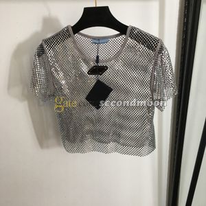 T-shirt ajouré sexy pour femmes, t-shirt avec strass brillants, Badge en métal de styliste, t-shirt en cristal