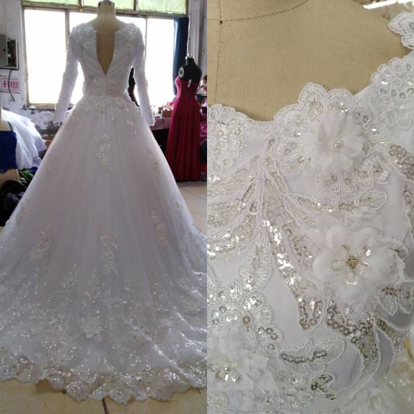 100% Images réelles Robe de mariée musulmane modeste avec manches longues Paillettes scintillantes Perles Cristaux Perles 3D Floral Applique Fleur Robe de mariée