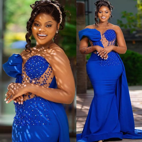 Sexy Illusion Boaded Mermaid Dresses con Peplum Sheer Sweetheart Neck Pearls Blue Satin Long Expess Vestido ASO EBI Árabe Africano Vesá