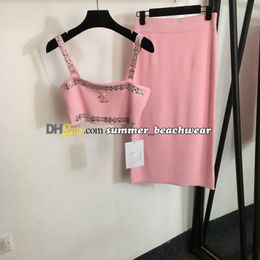 Sexy gebreid haltervest met hoge taille rokset Gebreide beha Strassbroche siert gebreid vest Damesmode Datum Sexy gebreide jurk