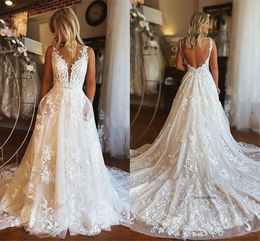 Robes de mariée sans dos en dentelle sexy avec poche A Line V Neck Appliques Tulle Summer Boho Robes de mariée plus taille BC15301 0509