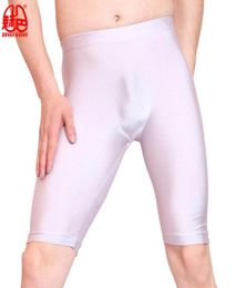 Sexy hommes huile brillant Lycra milieu pantalon sans couture solide U convexe élégant pochette demi-longueur boxeurs Gay porter longue jambe Club caleçon M2389993