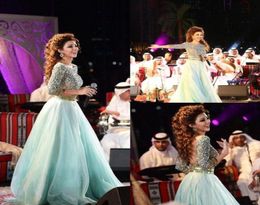 Sexy Mint Green Arabe Backless Robes de bal plus taille Crystals Crystals Rignestones Myriam Fares Robes Formes Pageant Robes Célébrité DR6041856