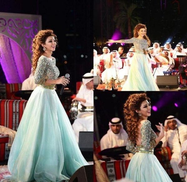 Sexy Mint Green Arabe Backless Robes de bal plus taille Crystals Crystals Rignestones Myriam Fares Robes Formes Pageant Robes Célébrité DR5763584