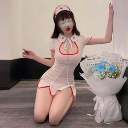 Disfraces de enfermera sexy Mujer Uniforme sexual Sheer Tulle Mini vestido Tanga Traje Halloween Cosplay Anime Trajes Lencería sensual 240307