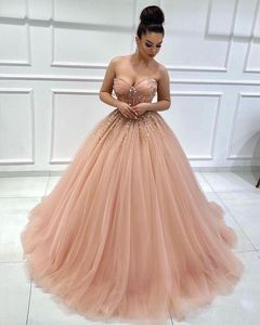Sexy quinceanera ball jurk jurken lieverd illusie kralen kristal blush roze tule vloer lengte plus size prom avondjurken