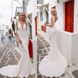 Sexy satijnen zeemeermin bruiloft spaghetti riemen backless bruidsjurken jurken jurken op maat gemaakte strand birde jurk
