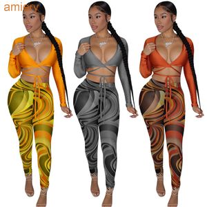 Sexy scherm afgedrukt tweedelige broek pak voor damesmode lange mouw tops en hoge elastische beenkappen cacual outfits