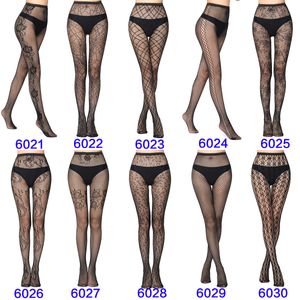 Sexy sokken tas hoog elastisch jacquard fishnet kousen karakter zijden spin web broek leggings vrouwen sexy geschoren aankomst sokken 230817