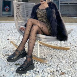 Sexy sokken maan zijden aandelen rollenspel kostuumaccessoires volledig gekoppeld aan sexy fishnet strakke passende mode zwart-witte lolita sokken q240427