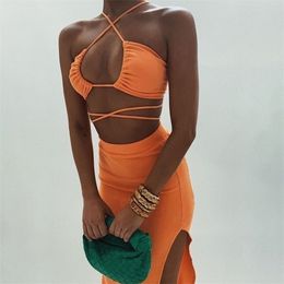 Sexy streetwear neon oranje twee stukken rok sets vrouwen trainingspak mode halter bandage tops en lange rokken matching set suits 220302