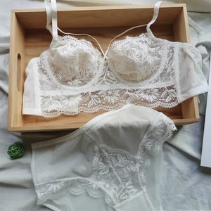 Sexy ultra-mince transparent en dentelle florale transparente et les sous-vêtements hauts hauts avec des pompes pour les sous-vêtements français des femmes 240430